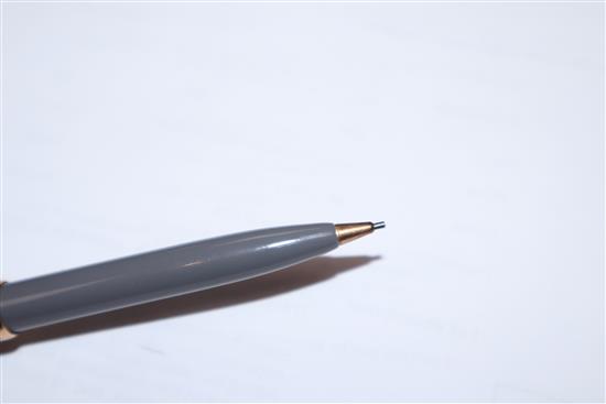 A Mont Blanc 252 grey finish fountain pen and propelling pencil set, cased and a Caran DAche silver ballpoint pen